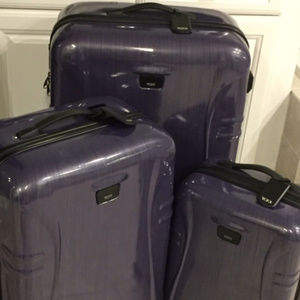 TUMI 3pc hard case luggage set